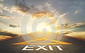 Road Exit sign leading to a hope and light in Golden cloud sunset sky, pathway to solution and freedom concept