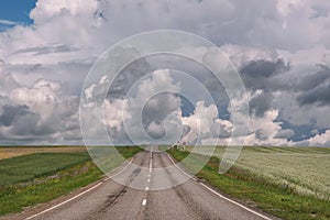 Road field buckwheat clouds sky overcast