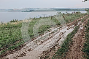 Road fishermen hunters river mud rut rain