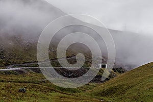 Road in fog mountain