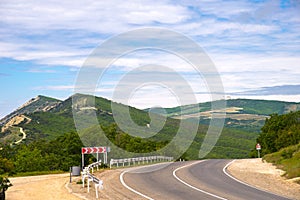 Road in foothills with old radar stations of Caucasus, Krasnodar region, Russia