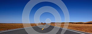 The road through grassland of Inner Mongolia