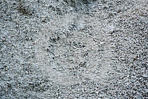 Road gravel, sand and granite gravel texture. Crushed Gravel background. Pile of Stones texture. Industrial coals