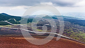 Road in hardened lava fields on Mount Etna