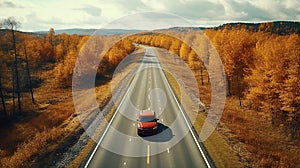 road highway autumn forest. the car is driving on the road