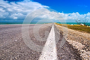 Road highway route leaving in ocean bulk man-made artificial dam from island of Cuba to Cayo Guillermo