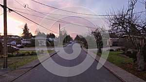 Road and Homes in Suburban Neighborhood, Sunset. Fall Season. Burnaby, British Columbia, Canada