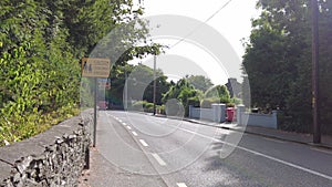 Road in Ireland with traffic sign Caution children crossing