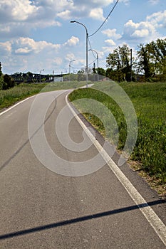 Road in the italian countryside in spring on a clear day