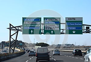 Road junction in the italian highway and indications to ROME and photo
