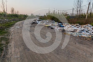Road through a landfill in Rasht, Ir photo