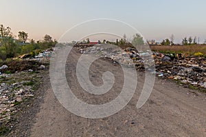 Road through a landfill in Rasht, Ir photo