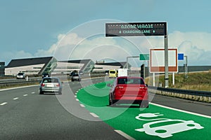 Road with lane for wireless charging