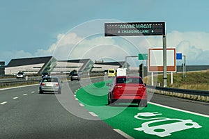 Road with lane for wireless charging photo