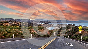 Sunset over Road leading down to Dana Point Harbor