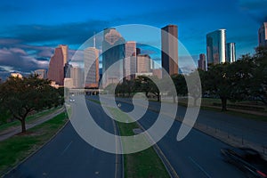 Road leading to city skyscrapers