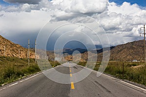 The road leading to the distance, the sky has strange clouds