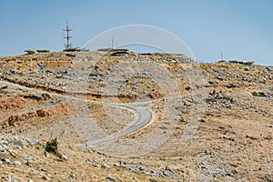 Road leading up to IDF observation towers, Mount Hermon, Israel photo