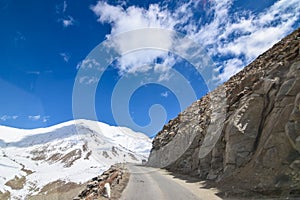 On the road in Leh Ladakh landscape.Khardung La pass.Road on snow mountain in northern India.