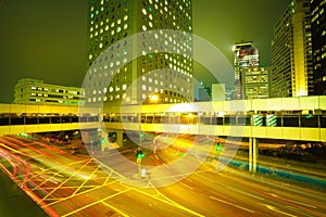 Road light trails on streetscape buildings backgrounds in HongKong