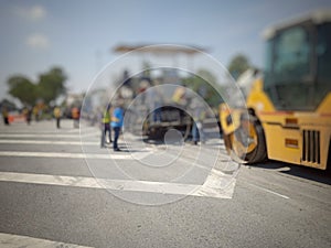 Road maintenance by burning old materials and improving quality