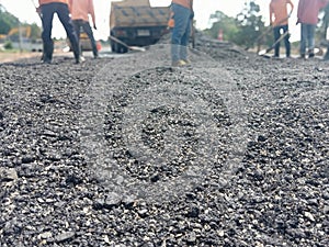 Road maintenance work using human labor blurred image