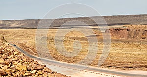 Road through Makhtesh Ramon, erosion crater landscape panorama, Negev desert, Israel