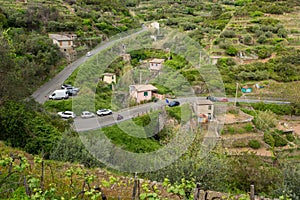 Road with many turns tackling a steep hill.