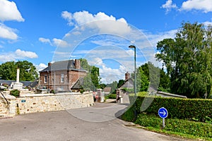 The road in the middle of the village of Saint Sylvain in Europe, France, Normandy, towards Veules les Roses, in summer, on a