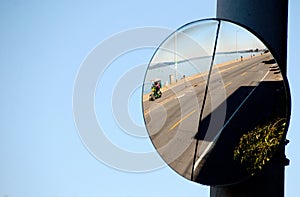 Road mirror on Alki Bach Drive