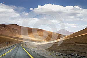 Road in Moon Valley dramatic landscape at Sunset, Atacama Desert, Chile