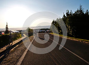 Road in Most, CZ at a large meeting of vintage cars in the afternoon sun