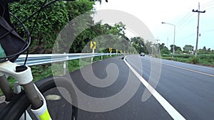 Road motion with cyclist beside