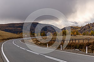 Road mountains asphalt clouds storm