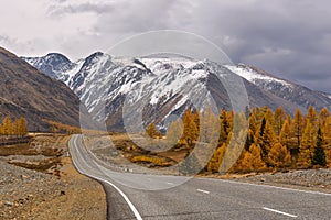 Road mountains asphalt thunderclouds