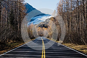 Road in the mountains during autumn in Alaska