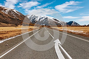 A road in the mountains with beautiful landscapes and views of rocks and peaks in Altai