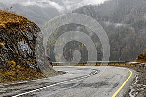 Road mountains fog hairpin curve