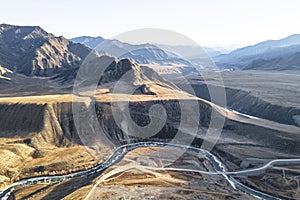 road in the mountains near a river. Chui highway is one of most beautiful roads in the world.