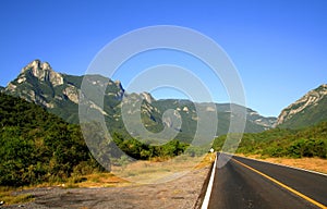 Road and mountains in nuevo leon, mexico I