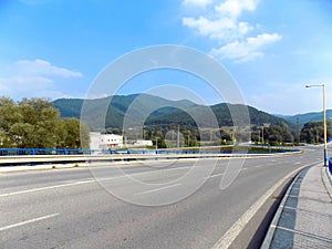 Road, mountains and sky