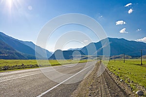 Road in mountains valley, Altai, Summer photo