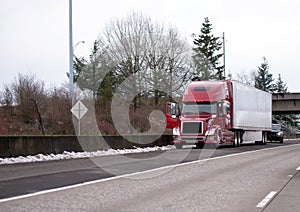 Road patrol Police inspects stopped long-haul big rig semi truck