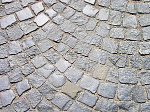 Road paving with setts.Square surface.