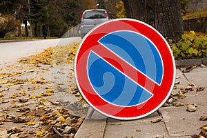 Road and prohibition signs of autumn