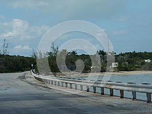 Road with railings over a small inlet with sea waters in George Town, Exuma Cays