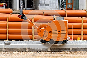 Road rammer machine on construction site
