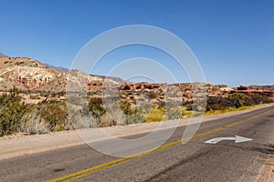 Road through the red rocks of Quebrada de Cafayate, Salta, Argentina