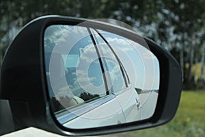 Road reflection in the mirror