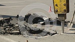 Road repair. Work details, preparation of asphalt pavement for laying new asphalt.